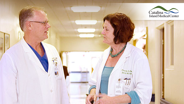Doctors talking in a hallway