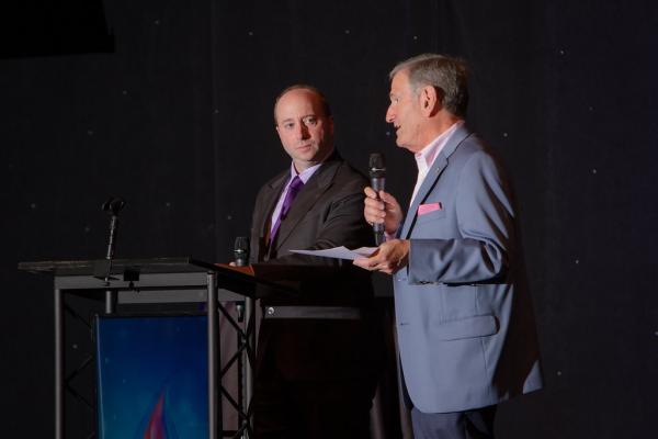 Two men speaking at Spirit of Innovation Gala 2018 reception