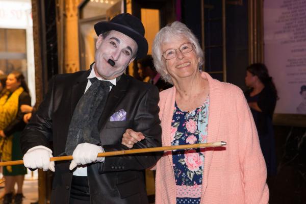 Spirit of Innovation Gala attendee with Charlie Chaplin impersonator