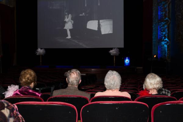 Spirit of Innovation Gala attendees watching a film