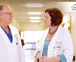 Doctors talking in a hallway