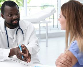 Doctor talking with patient